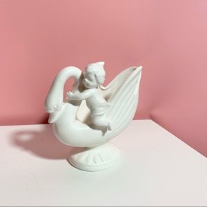 Vintage baby on swan vase